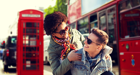 Image showing happy teenage couple having fun in london city