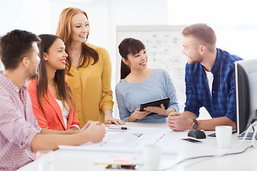 Image showing happy creative team or students working at office