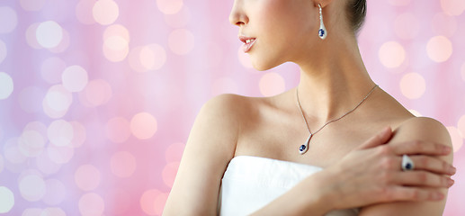 Image showing beautiful woman with earring, ring and pendant