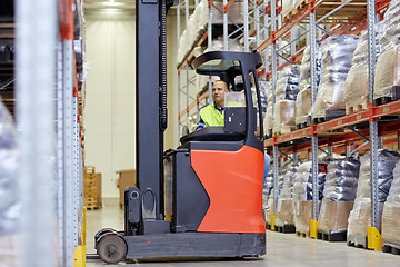 Image showing man operating forklift loader at warehouse