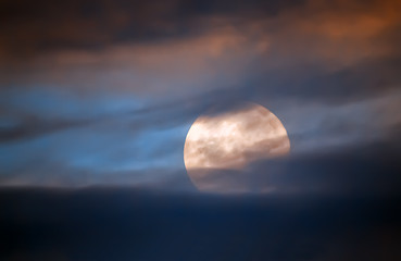 Image showing Full moon behind clouds