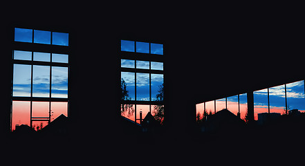 Image showing View on night sky through windows of the hangar