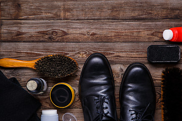 Image showing Shoe wax, brush and boot