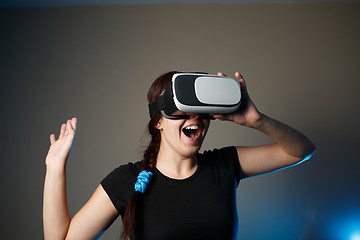 Image showing Woman using the virtual reality headset