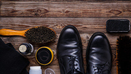 Image showing Shoe wax, brush and boot