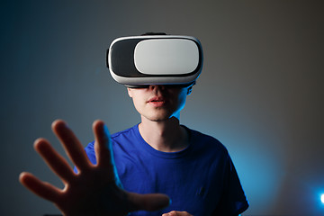 Image showing Man wearing virtual reality goggles.