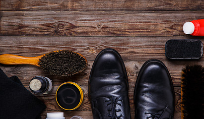 Image showing Shoe wax, brush and boot