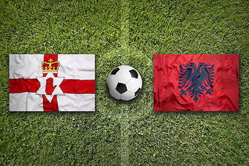 Image showing Northern Ireland vs. Albania flags on soccer field