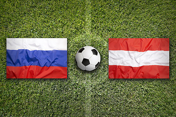 Image showing Russia vs. Austria flags on soccer field