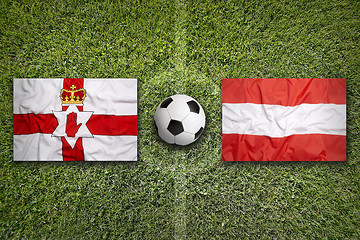 Image showing Northern Ireland vs. Austria flags on soccer field