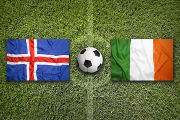 Image showing Iceland vs. Ireland flags on soccer field