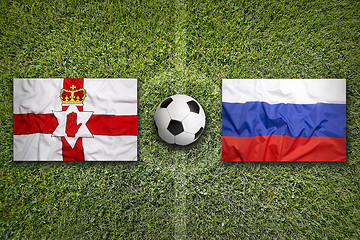 Image showing Northern Ireland vs. Russia flags on soccer field