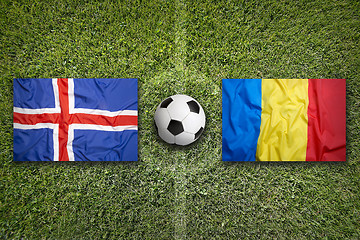 Image showing Iceland vs. Romania flags on soccer field