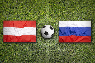 Image showing Austria vs. Russia flags on soccer field