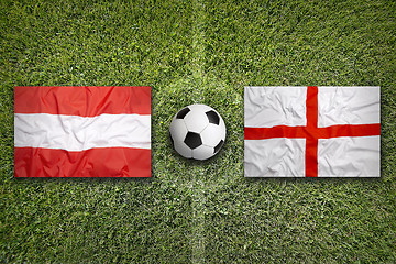 Image showing Austria vs. England flags on soccer field