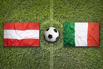 Image showing Austria vs. Italy flags on soccer field