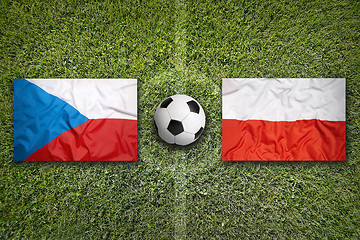 Image showing Czech Republic vs. Poland flags on soccer field