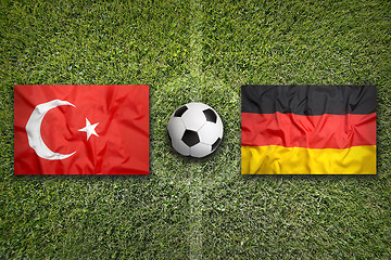Image showing Turkey vs. Germany flags on soccer field