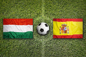 Image showing Hungary vs. Spain flags on soccer field