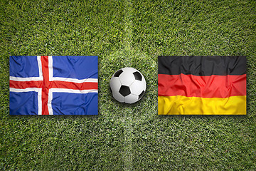 Image showing Iceland vs. Germany flags on soccer field