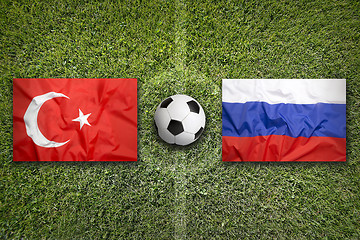 Image showing Turkey vs. Russia flags on soccer field