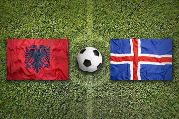 Image showing Albania vs. Iceland flags on soccer field
