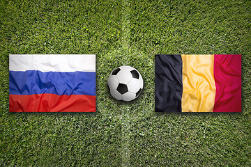 Image showing Russia vs. Belgium flags on soccer field