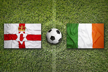 Image showing Northern Ireland vs. Ireland flags on soccer field