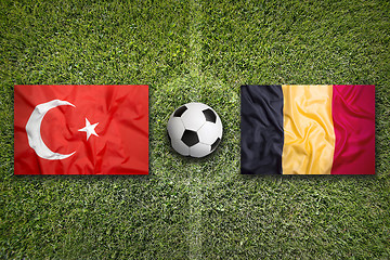 Image showing Turkey vs. Belgium flags on soccer field