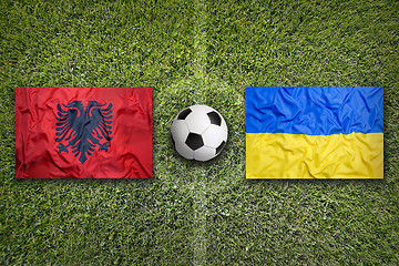 Image showing Albania vs. Ukraine flags on soccer field