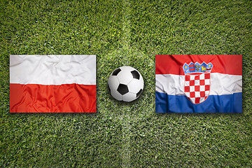 Image showing Poland vs. Croatia flags on soccer field