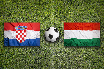 Image showing Croatia vs. Hungary flags on soccer field