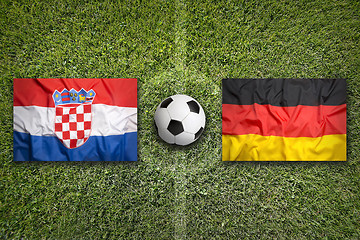 Image showing Croatia vs. Germany flags on soccer field