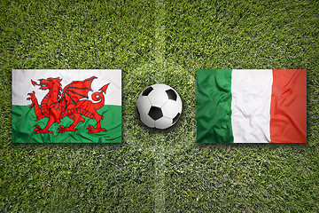 Image showing Wales vs. Italy flags on soccer field