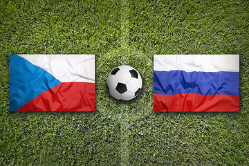 Image showing Czech Republic vs. Russia flags on soccer field