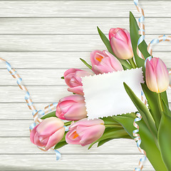 Image showing Tulip flowers on wood background. EPS 10