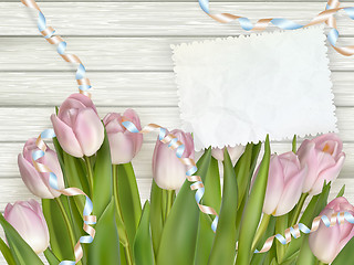 Image showing Bouquet of tulips on rustic wooden board. EPS 10