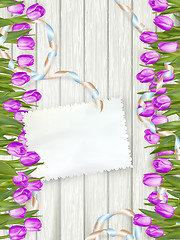 Image showing Tulips lying on a white textured table. EPS 10