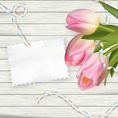 Image showing Bouquet of tulips on rustic wooden board. EPS 10