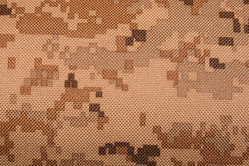 Image showing close up of worn out olive green tone camouflage fabric