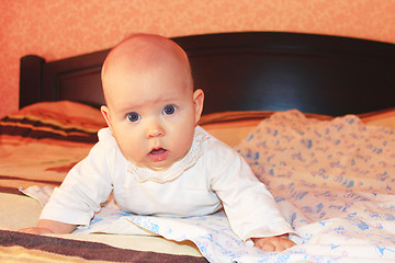 Image showing little baby lying on the bed