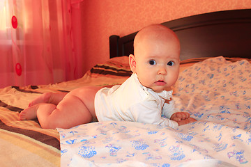Image showing little baby lying on the bed