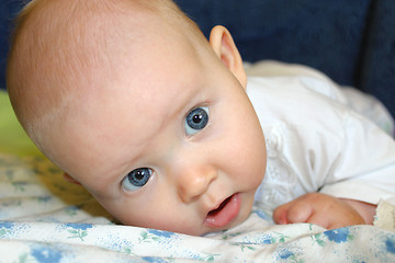 Image showing little baby lying on the bed