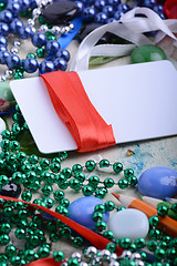 Image showing Happy Valentine Day card with paper heart on table. Red hearts, flower, gift, pencil on table