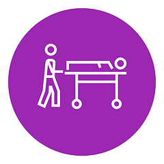 Image showing Man pushing stretchers line icon.