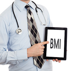 Image showing Doctor holding tablet - BMI