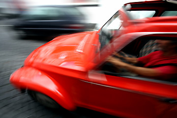 Image showing Man driving fast