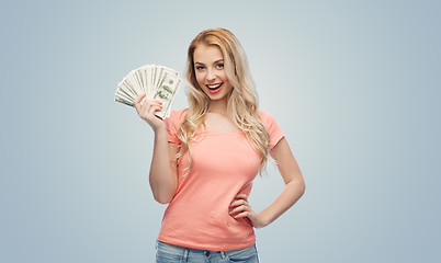 Image showing happy young woman with usa dollar cash money