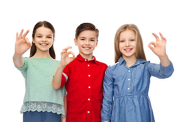 Image showing happy boy and girl showing ok hand sign