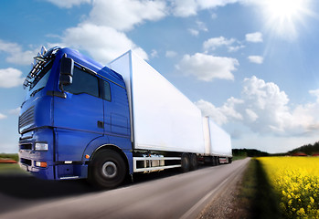 Image showing truck driving on country-road/motion